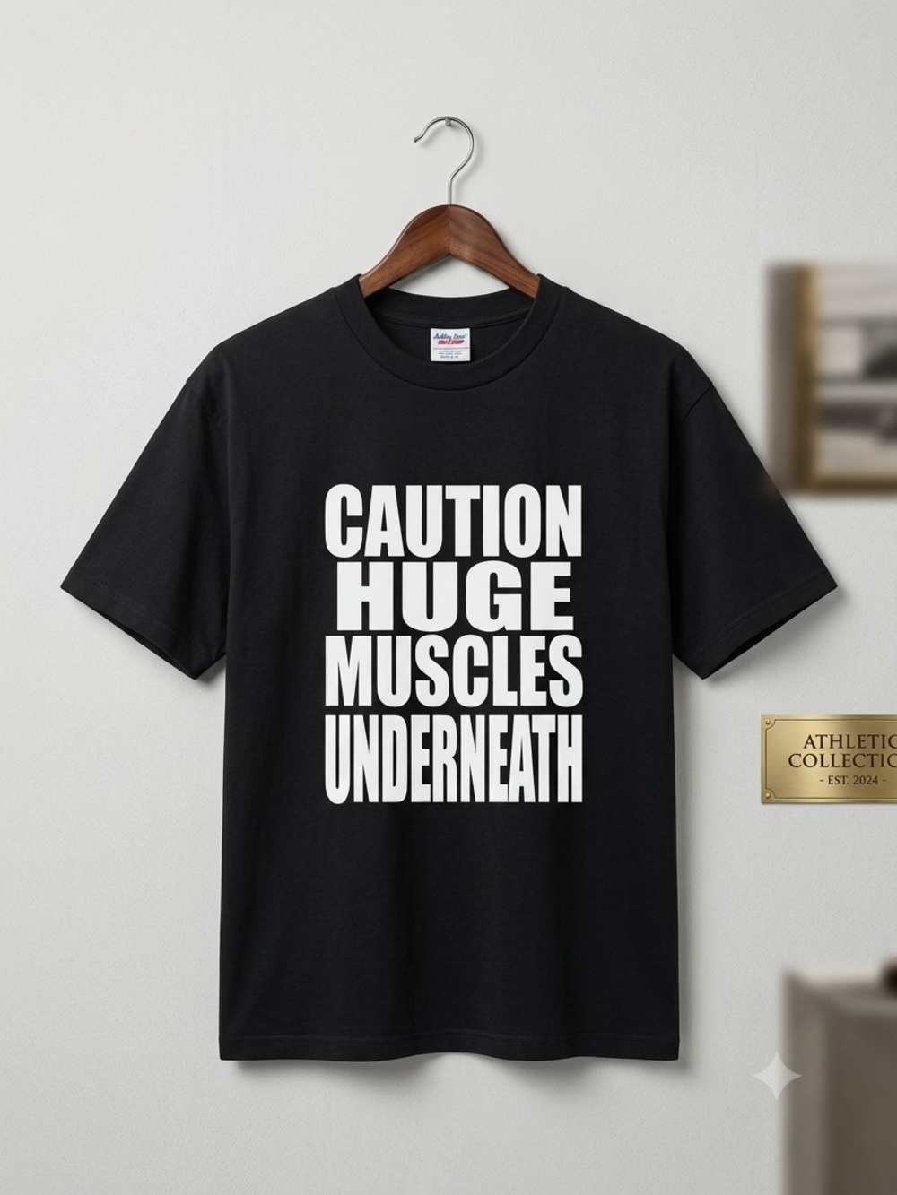 Athletic Collection Black Graphic Tee - "Caution Huge Muscles Underneath"